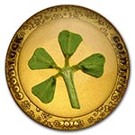 монета с четырехлистным клевером